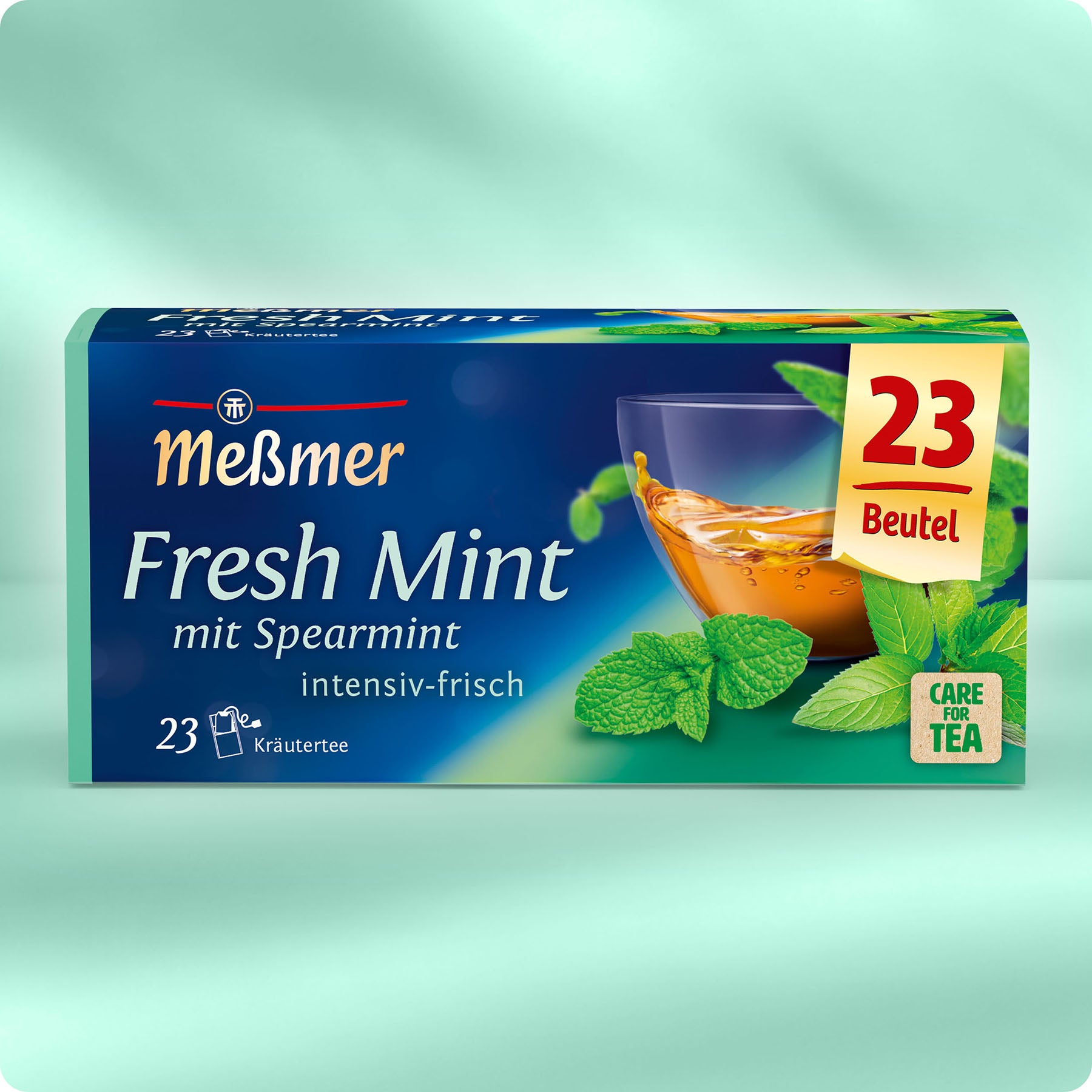 Meßmer Fresh Mint Kräutertee mit Spearmint, 23 Beutel, zeigt frische Minzblätter und eine Tasse Tee für intensiven Geschmack und belebendes Aroma.