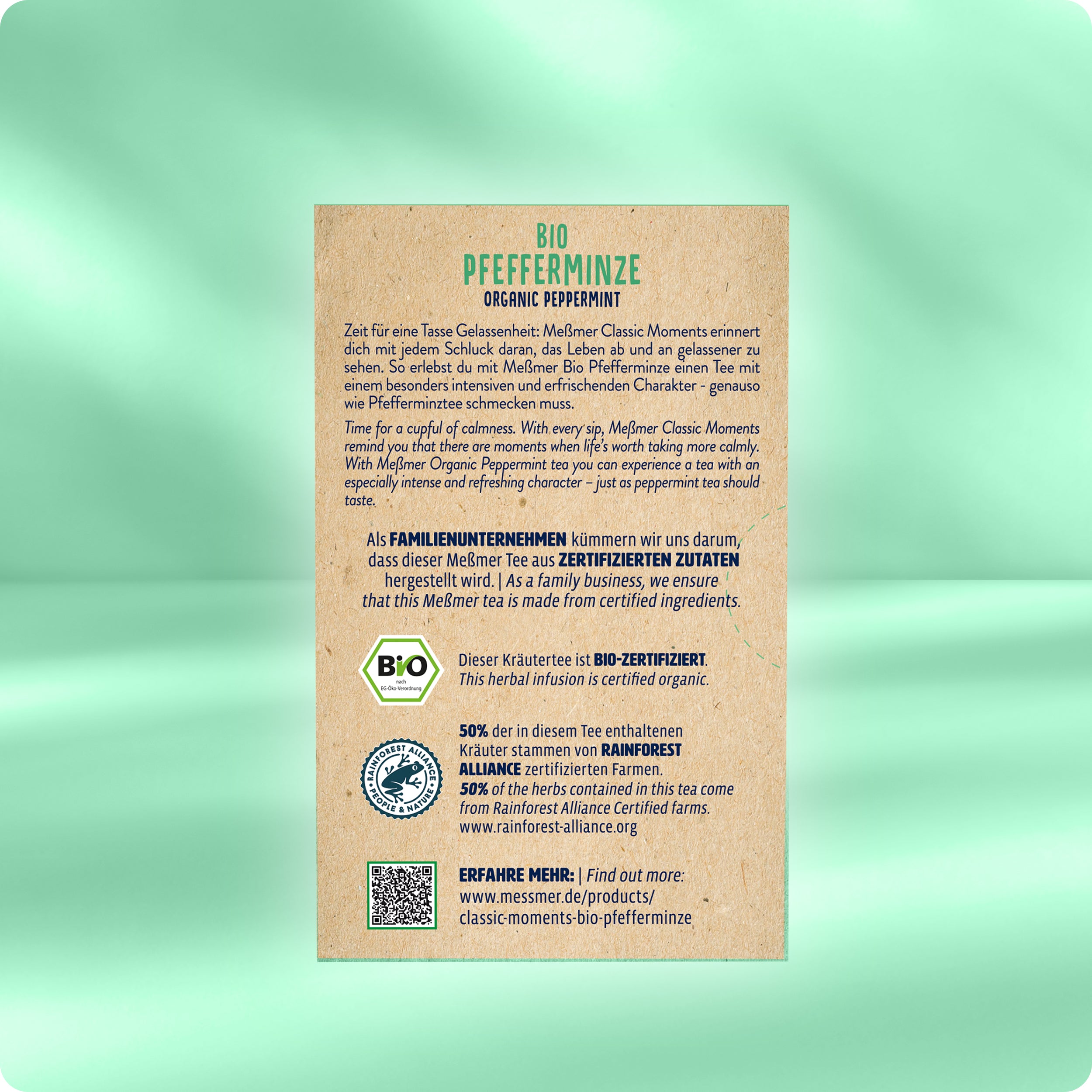 Rückseite der Bio Pfefferminze Verpackung mit Infos zu zertifizierten Zutaten, Rainforest Alliance Siegel, Familienunternehmen und QR-Code auf naturfarbenem Hintergrund.