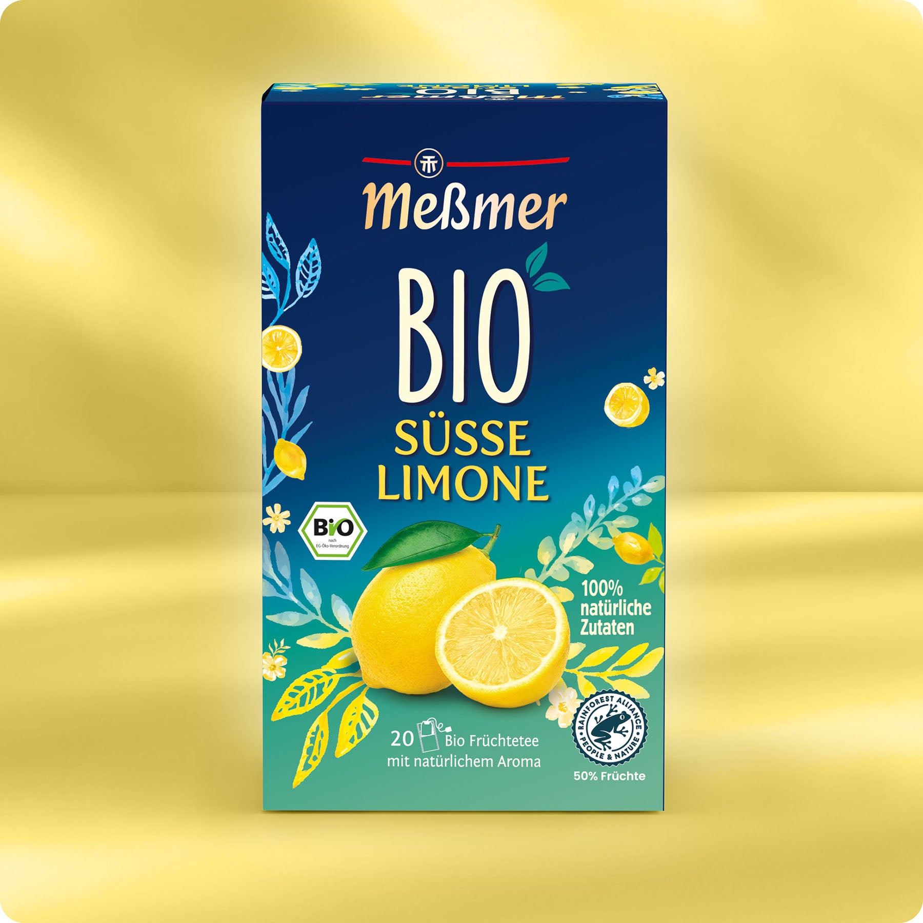 Eine Schachtel Meßmer DE Bio Süße Limone zeigt reife Zitronen und grüne Blätter auf einer blau-gelben Verpackung, die den spritzigen Geschmack hervorhebt und 20 Bio-Früchteteebeutel enthält.