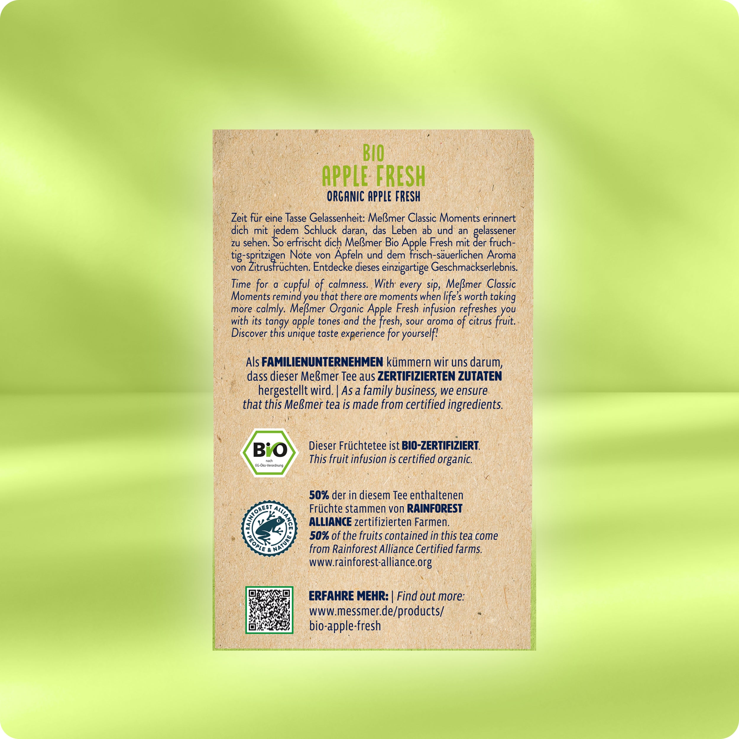 Rückseite der Bio Apple Fresh Verpackung mit Infos zur Bio-Zertifizierung, Rainforest Alliance Siegel, Zutatenhinweisen und QR-Code auf hellem, naturfarbenem Hintergrund.